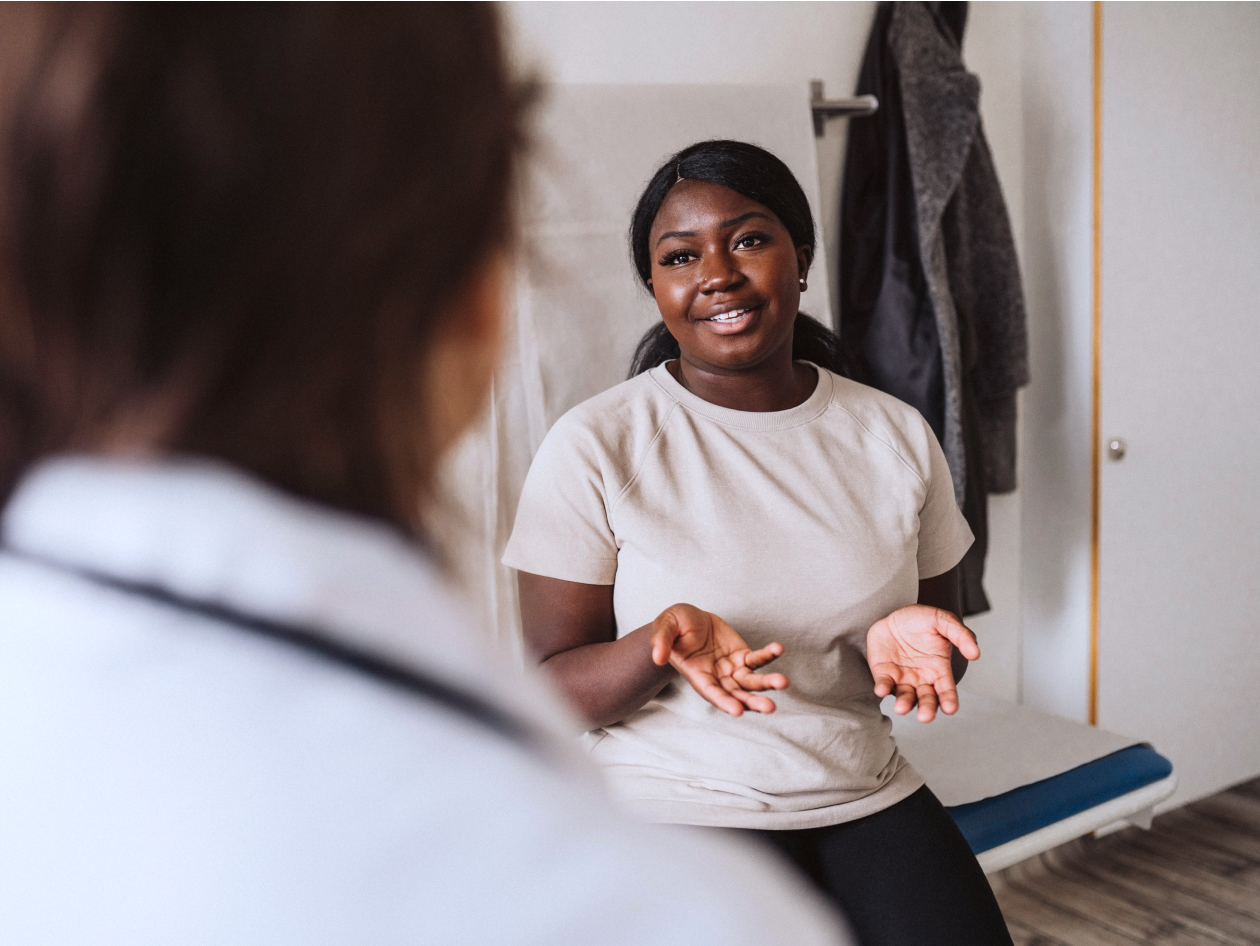 A healthcare professional and patient in discussion.